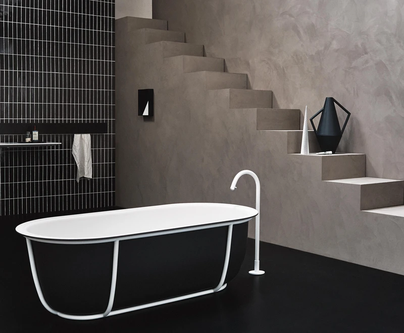 Devon & Devon’s colourful Admiral bathtubs with traditionally-styled feet (top, middle) and Agape’s contemporary Cuna bath in a tubular steel frame (bottom) are both high-contrast statement features